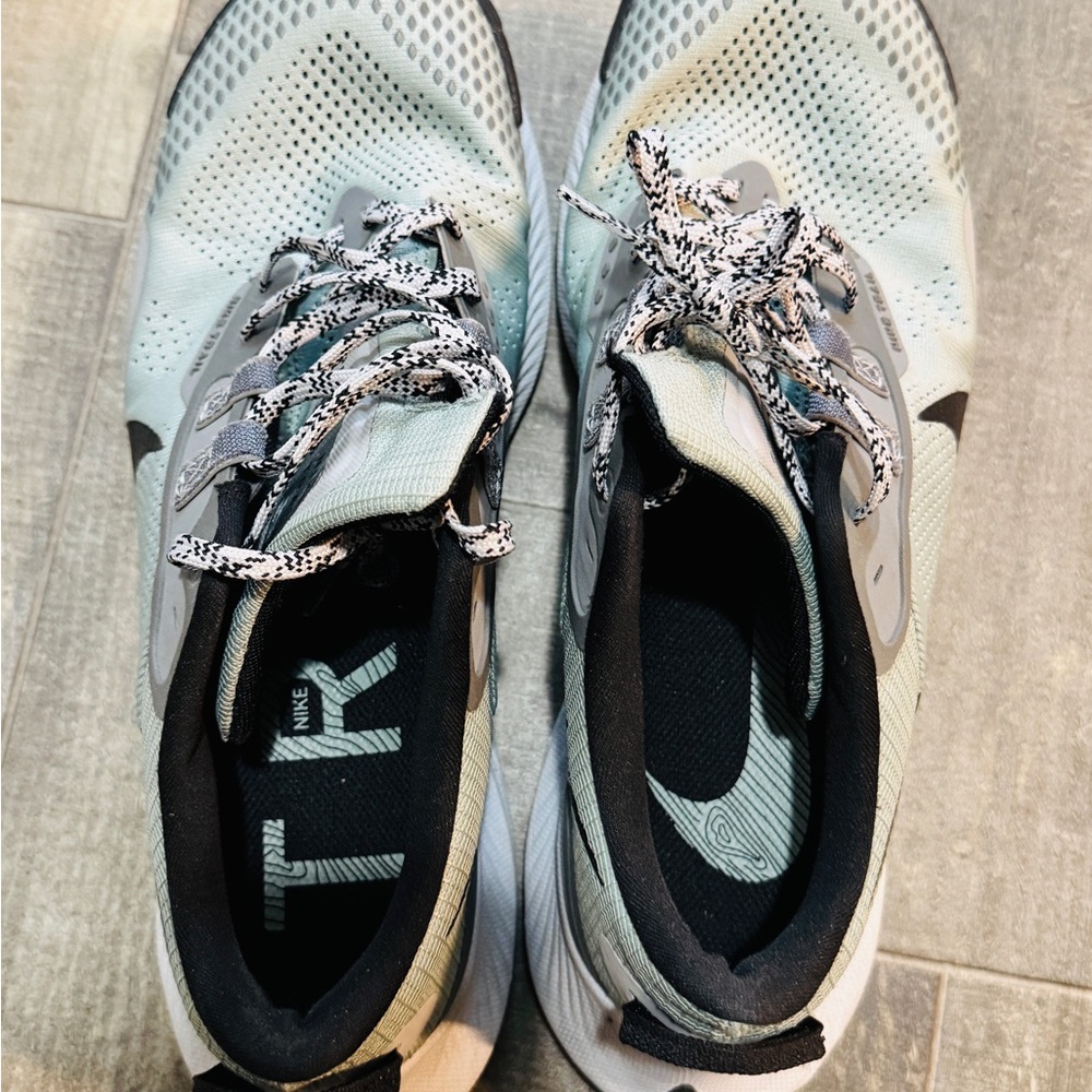 Nike Light Green Running Shoes with Black and White Details